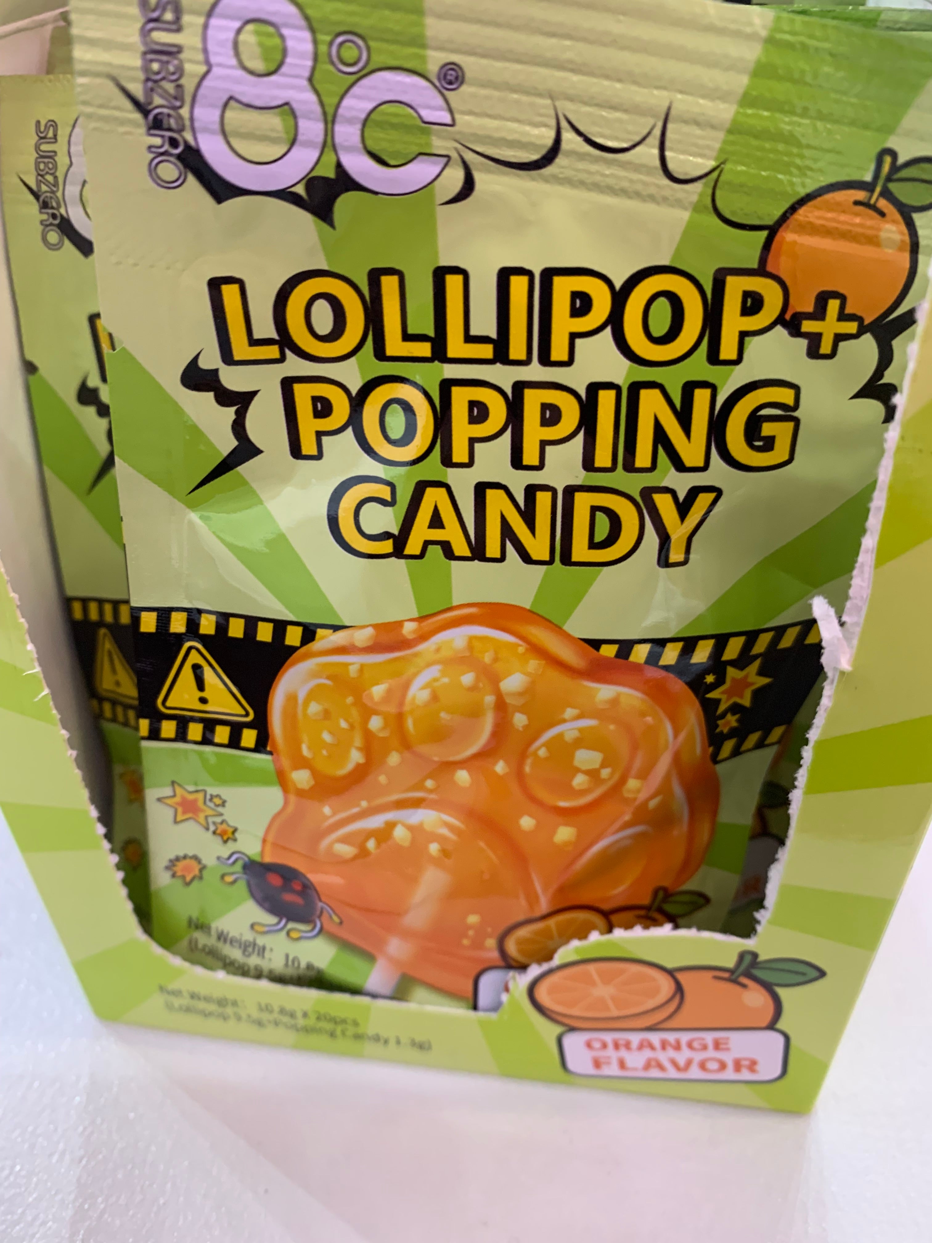 Lollipop popping candy orange flavour